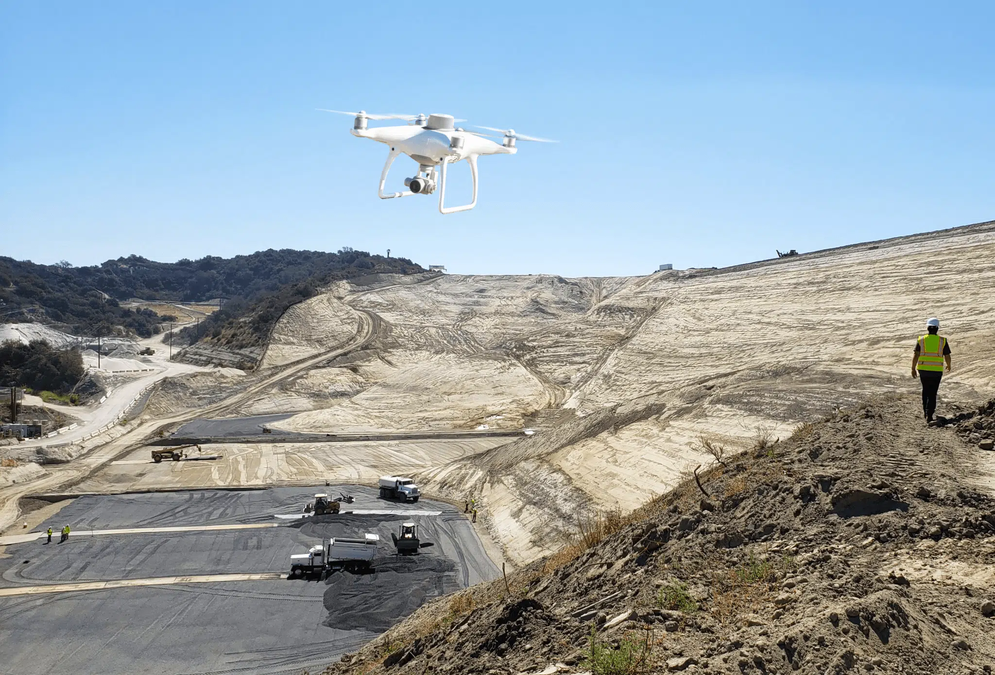 drone flying over landfill