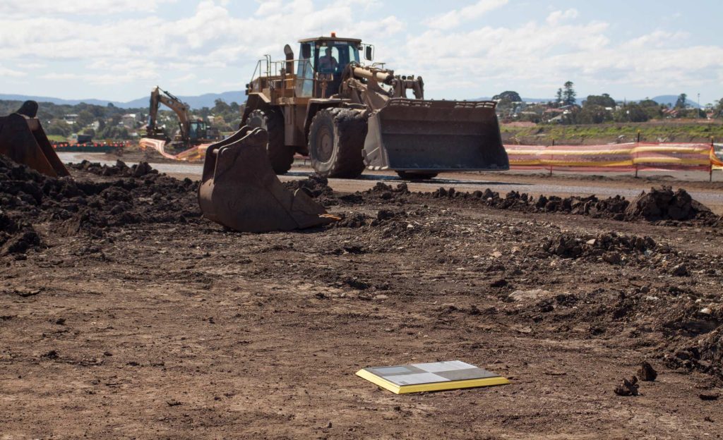 An AeroPoint, Drone survey Ground Control Point on a construction site. 