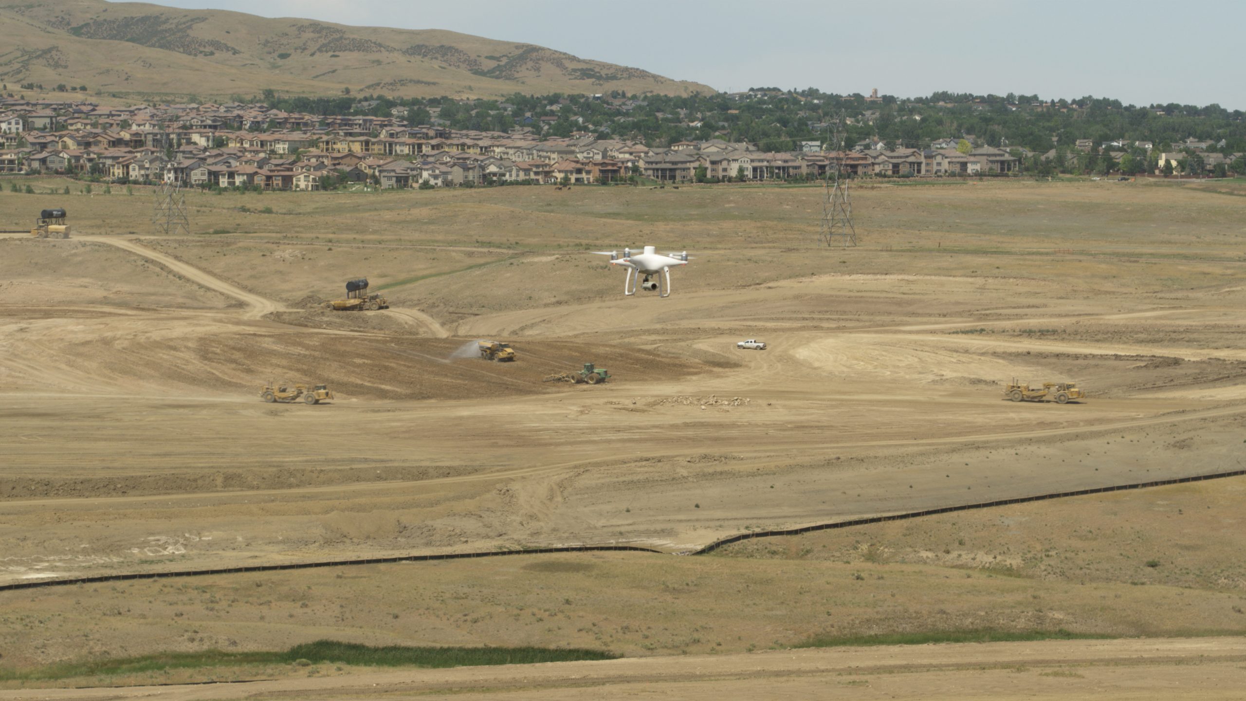 Drone surveying over a worksite