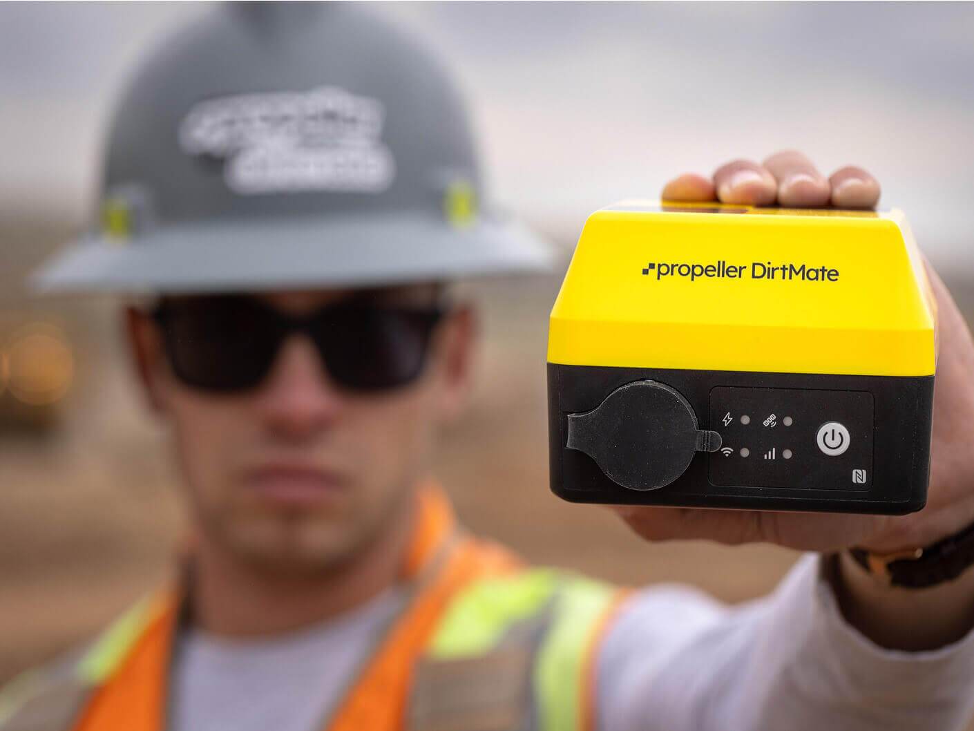 Propeller DirtMate being held by a construction worker