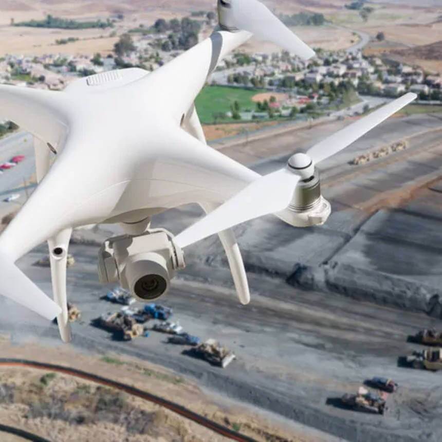 drone flying over a construction site