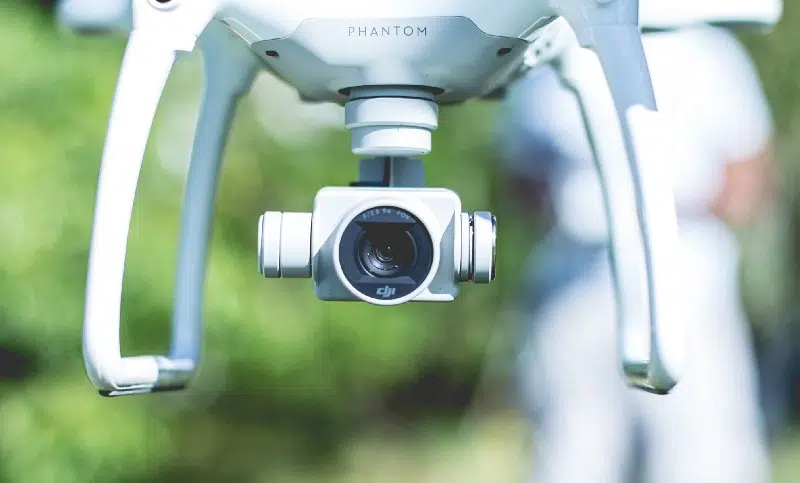 Close-up photo of a Phantom drone and DJI lens.