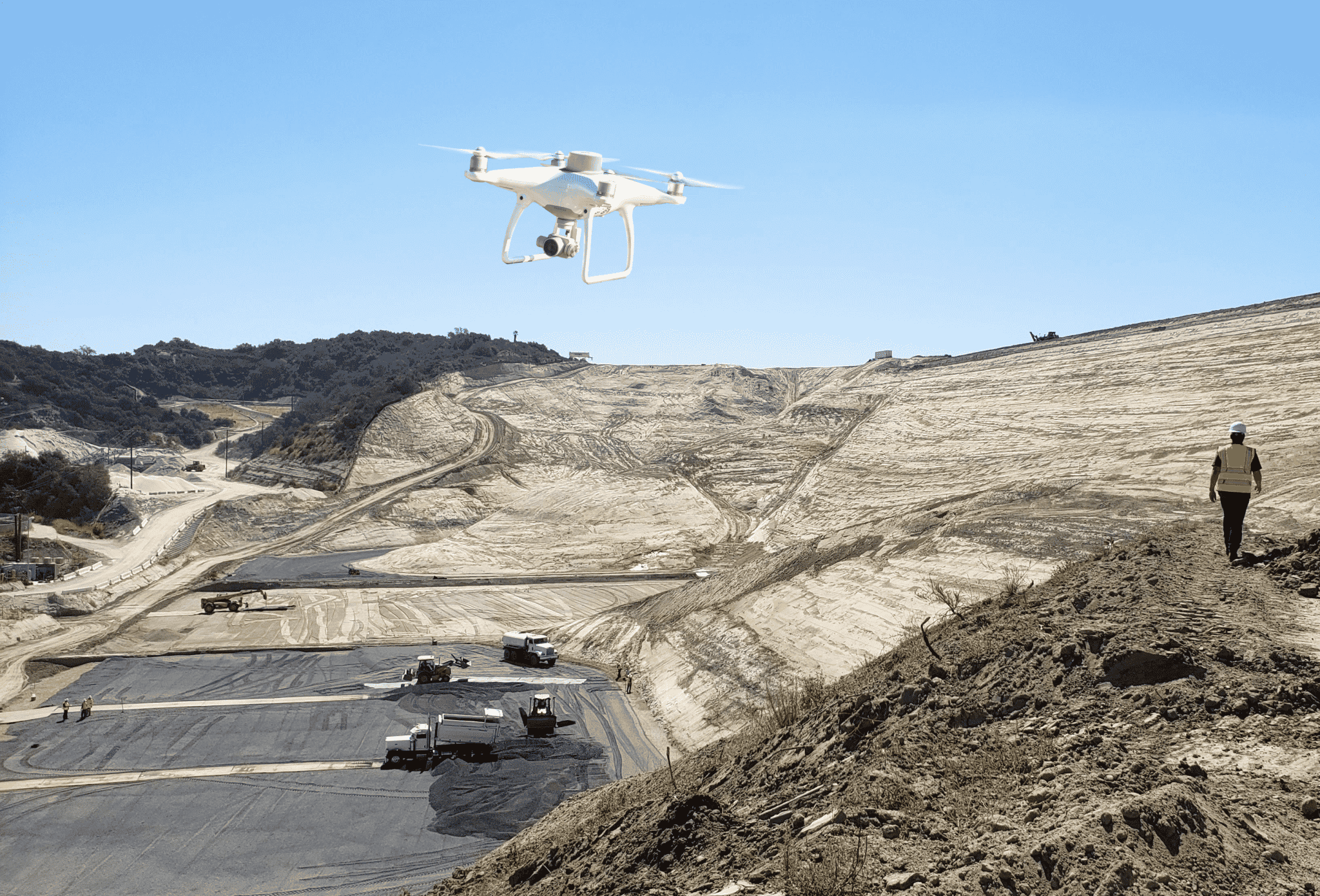 A drone flying over a landfill site.