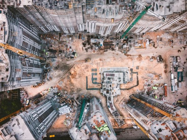 Aerial photo looking down at high-rise building site.