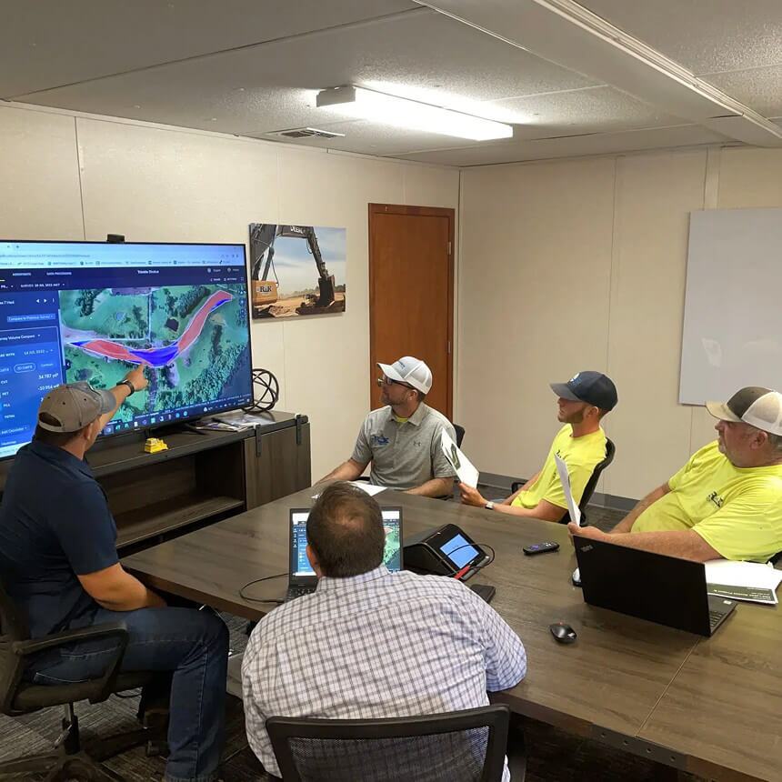 RK excavation team members at a conference table