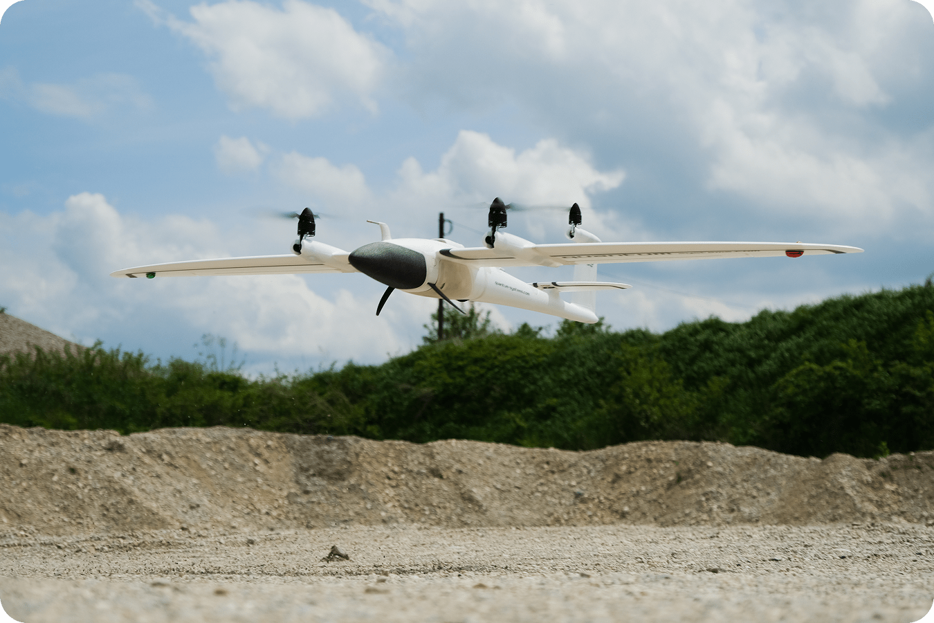 Quantum trinity drone flying over construction site