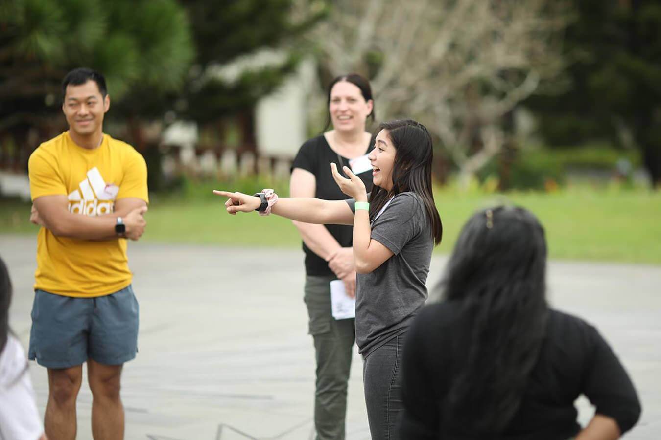 Propeller team standing in the park connecting with one another
