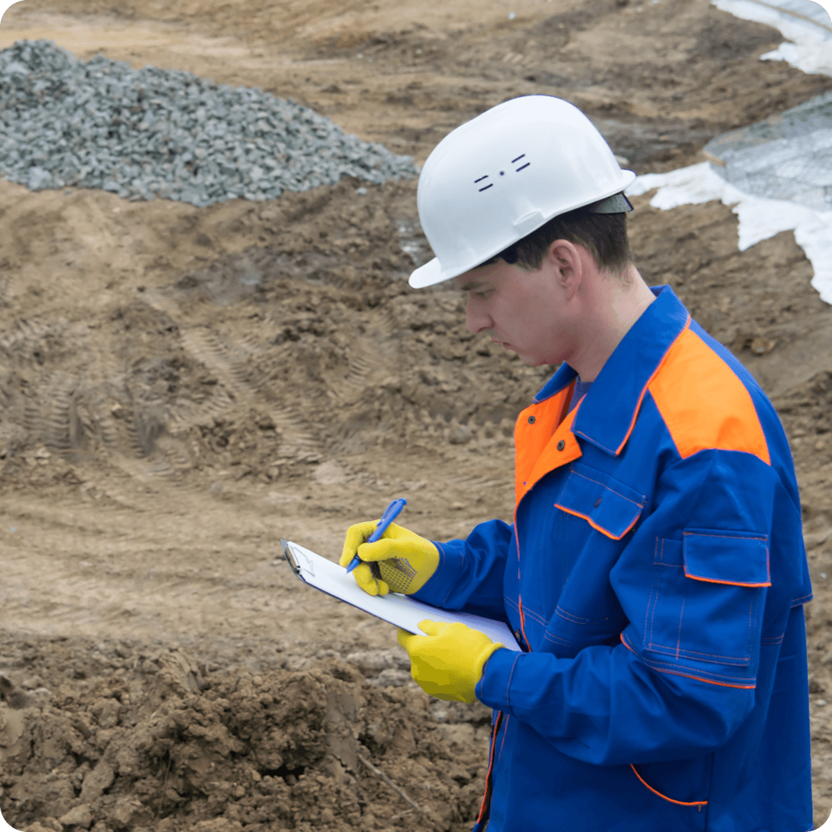 estimator on site checking off a list