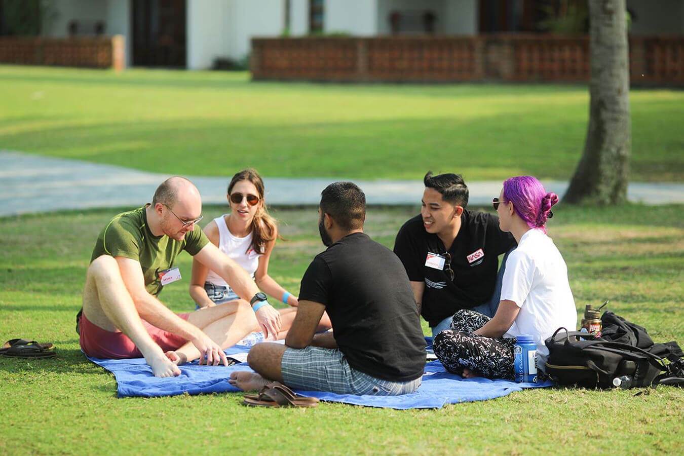 People sitting around conneting on the Propeller Vietnam retreat.