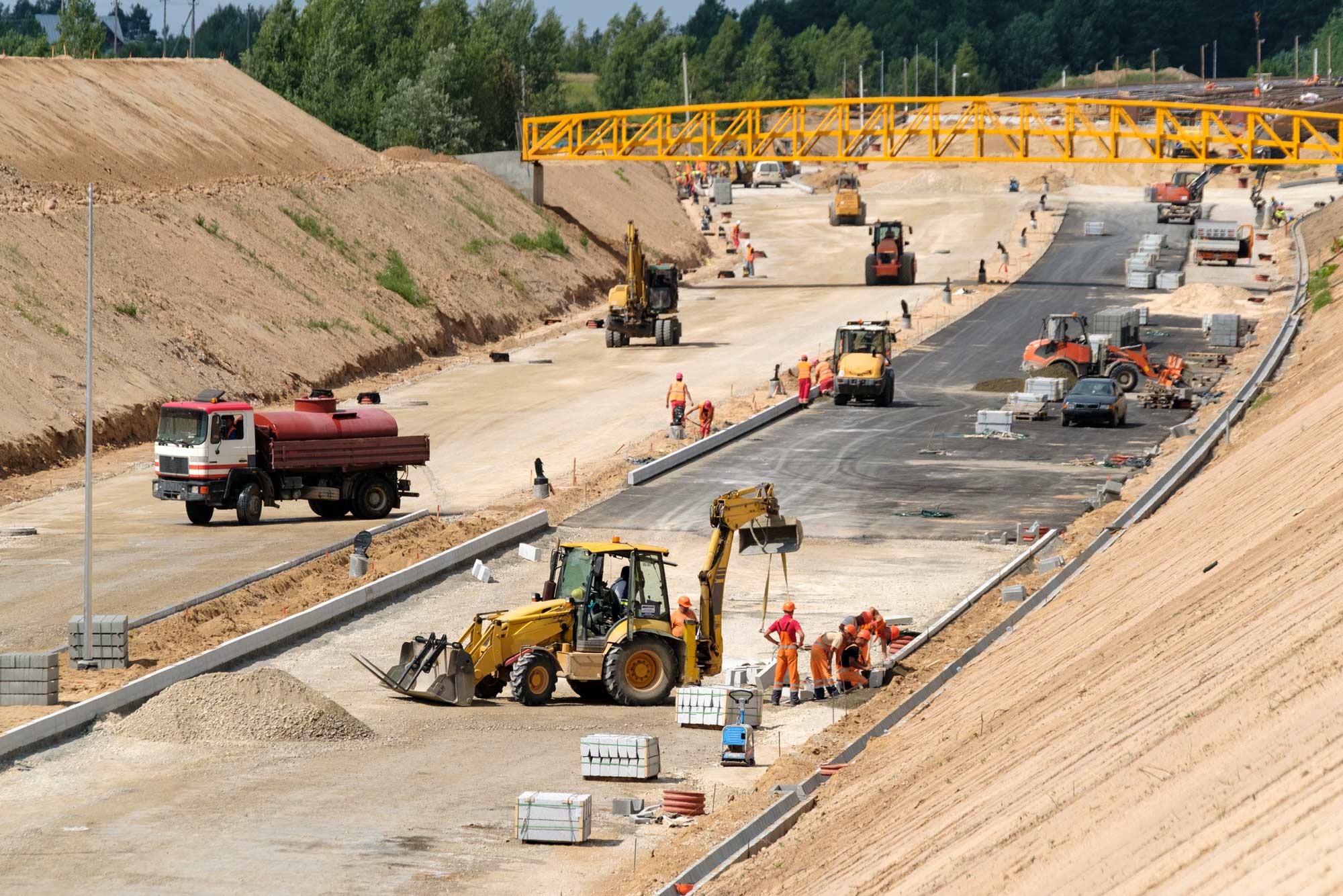 Photo of a busy highway construction site.